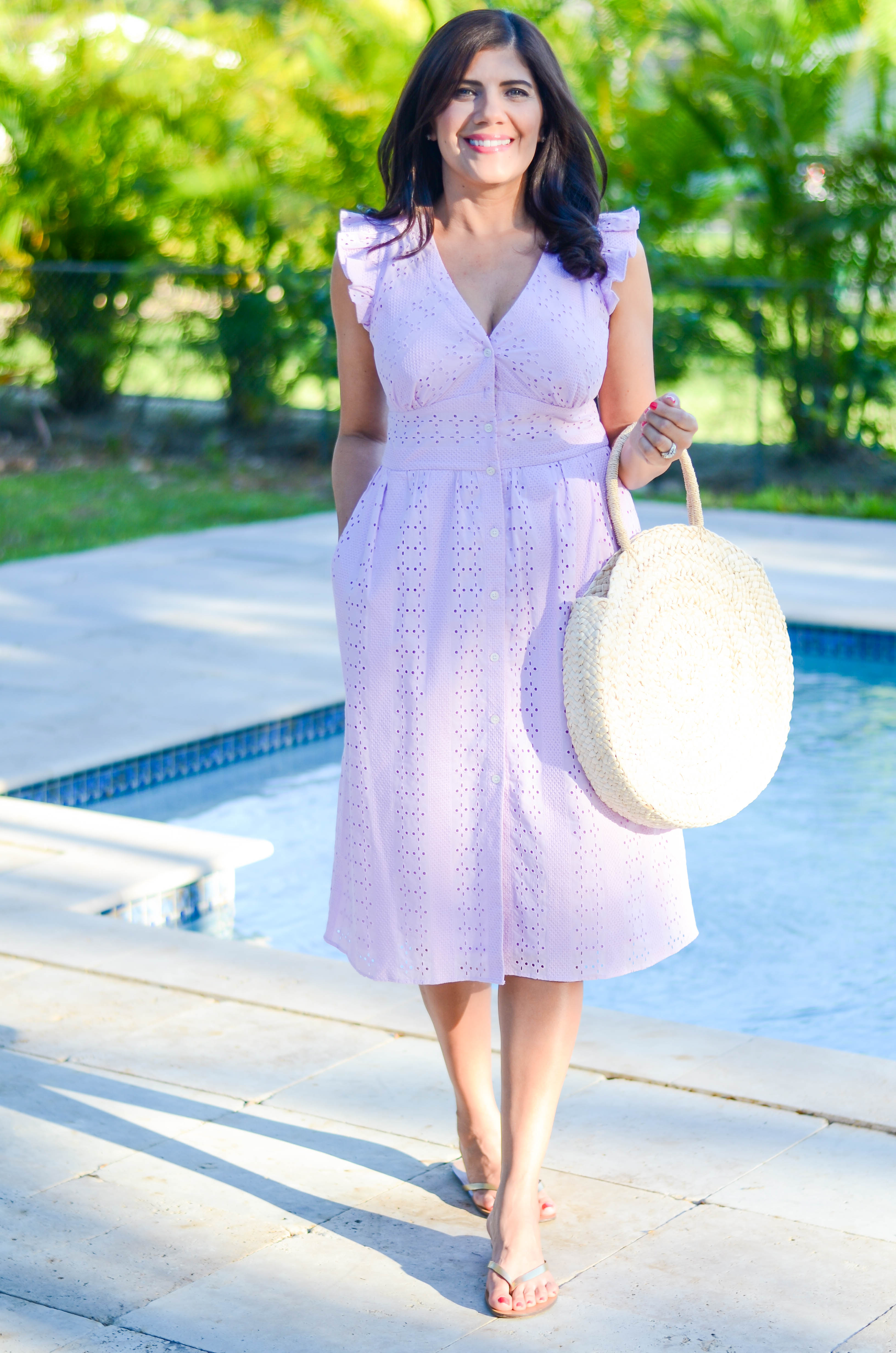 Lifestyle Blogger, Desiree of Beautifully Seaside, styles a ruffle eyelet dress in this season's must have lavender color. 