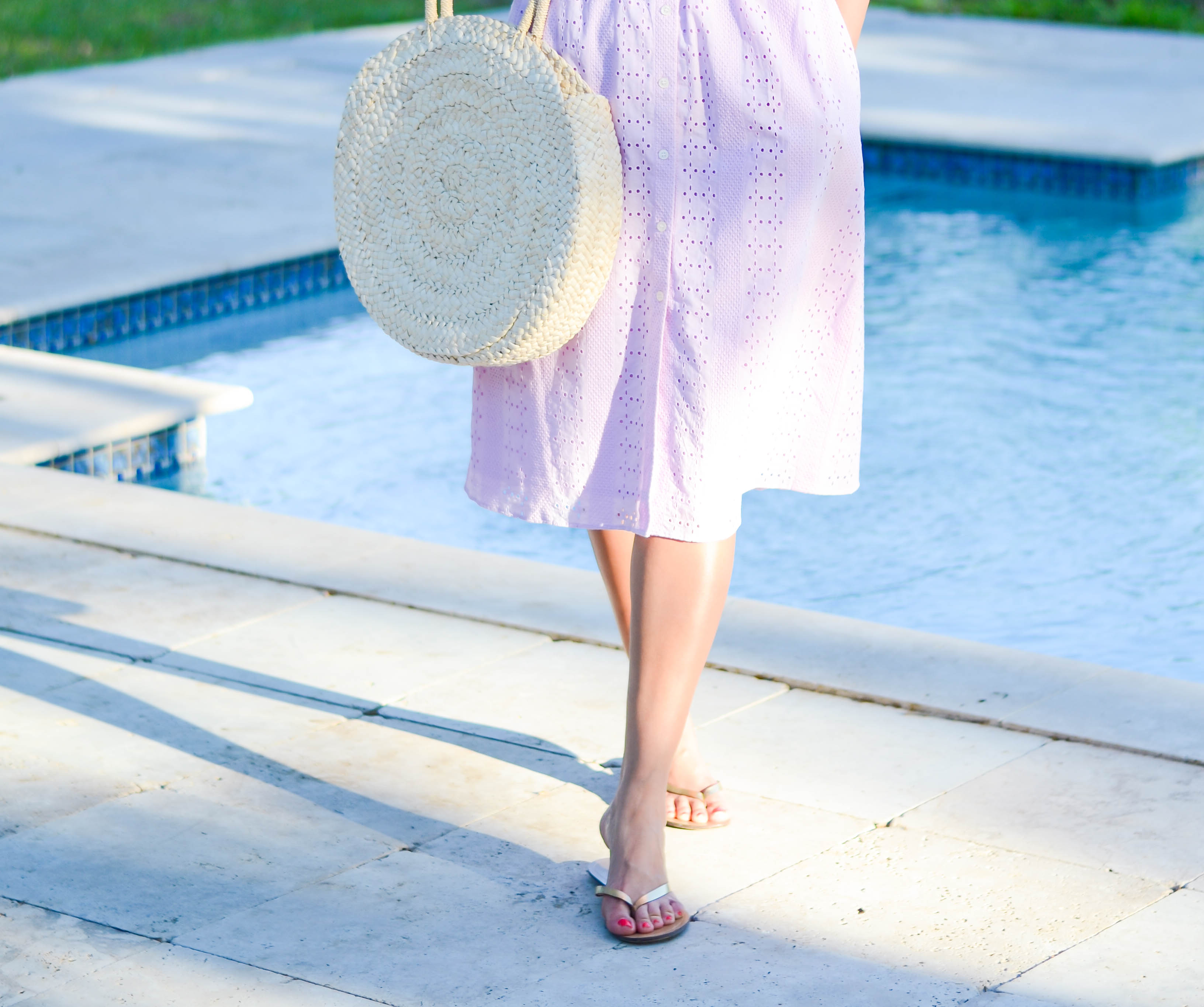 Lifestyle Blogger, Desiree of Beautifully Seaside, styles a ruffle eyelet dress in this season's must have lavender color. 