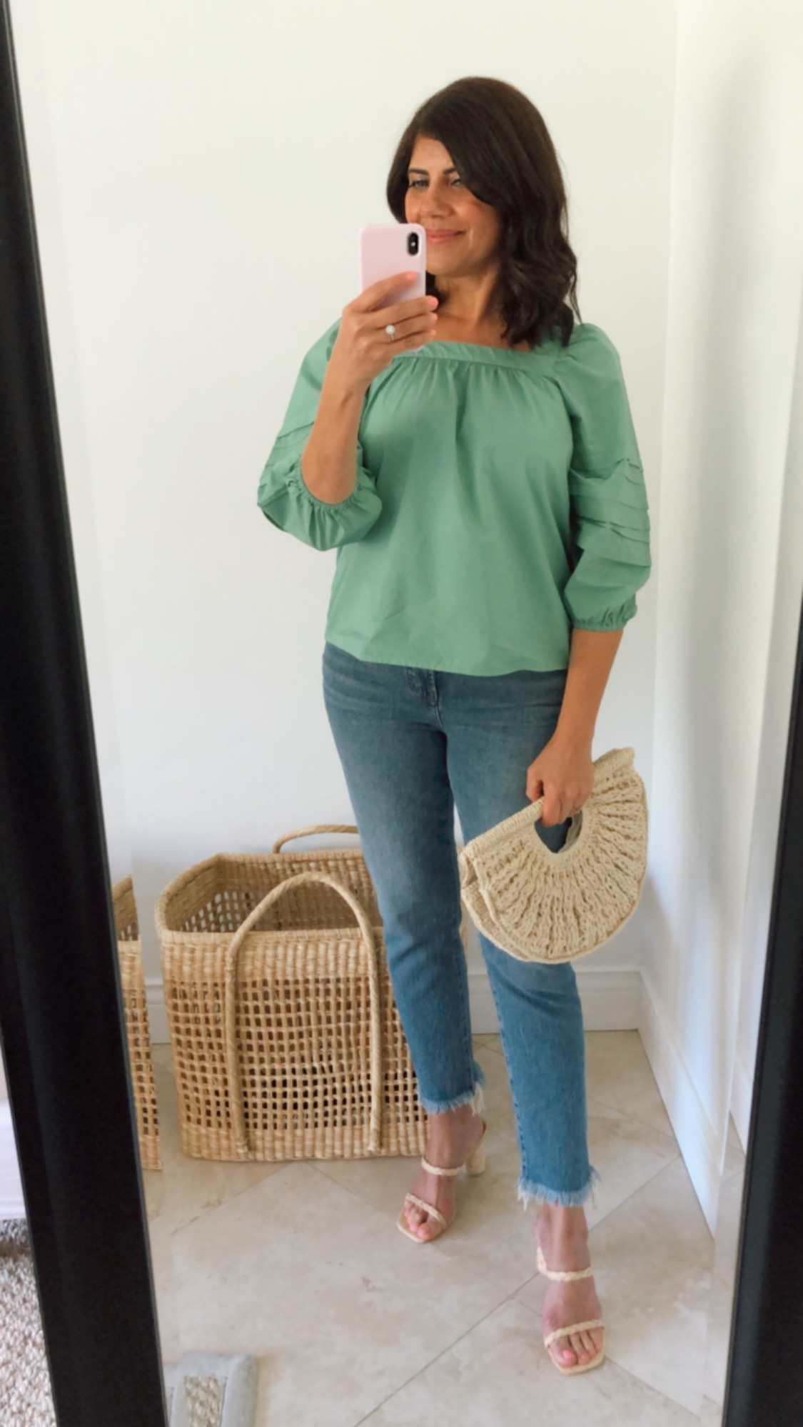 Desiree Leone of Beautifully Seaside features a mini spring try-on session. Shop the best vintage style jeans and three gorgeous tops for spring.
