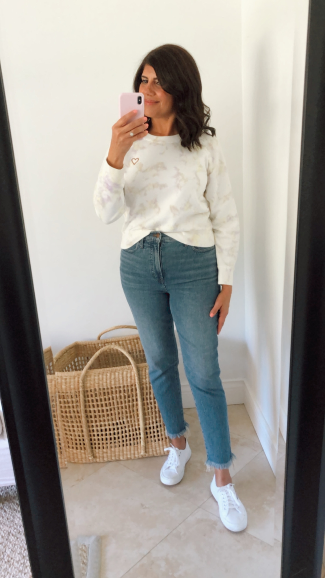 Desiree Leone of Beautifully Seaside features a mini spring try-on session. Shop the best vintage style jeans and three gorgeous tops for spring.