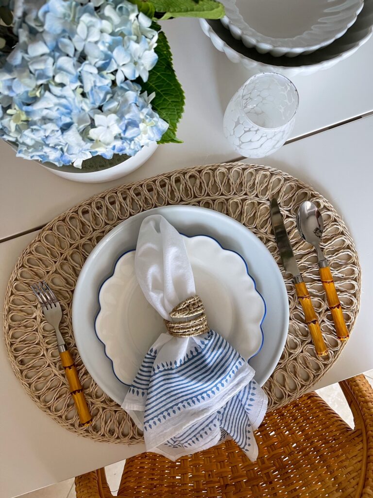 Get all the details on creating a blue and white coastal tablescape you can enjoy with your family or guests.