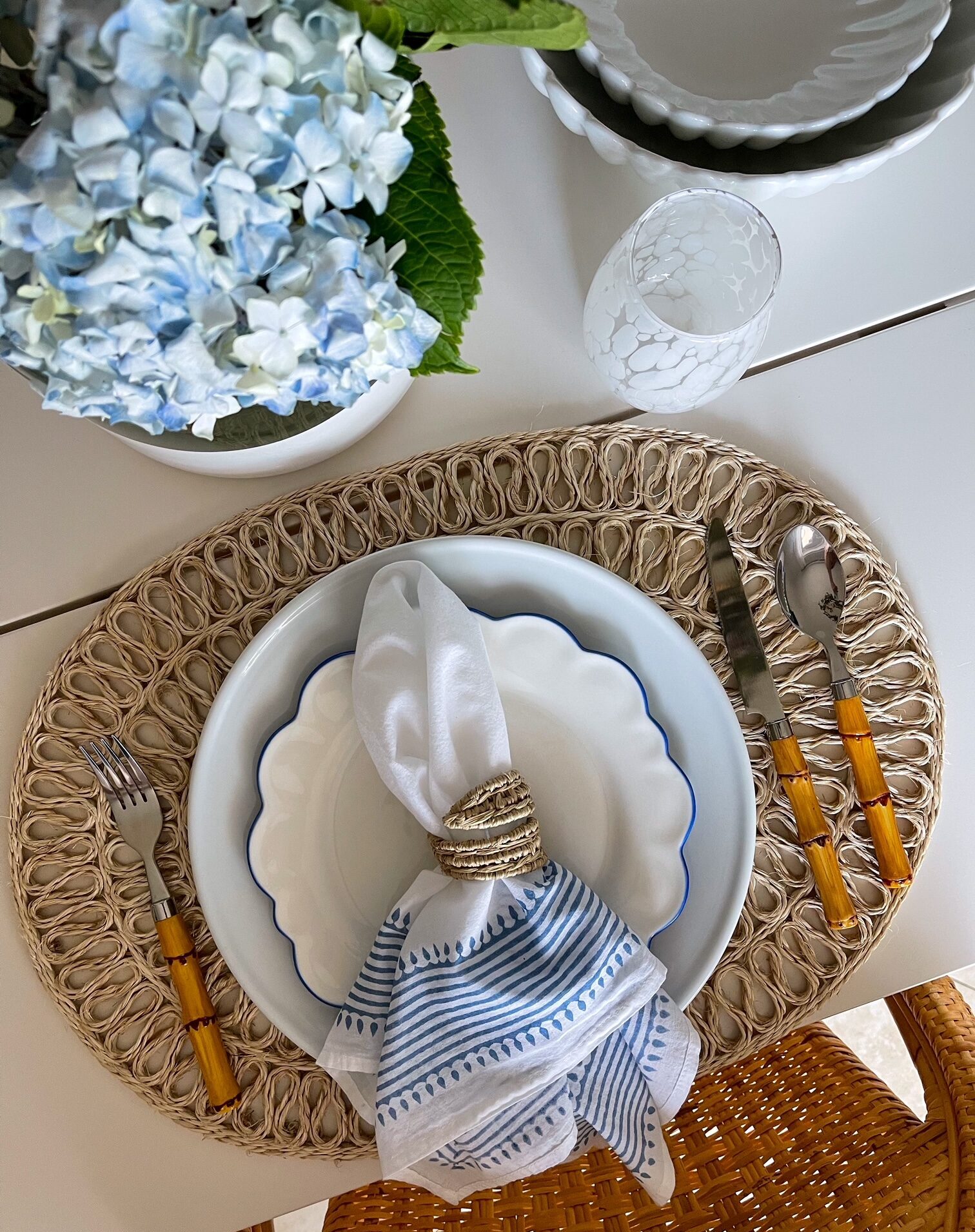 Get all the details on creating a blue and white coastal tablescape you can enjoy with your family or guests.