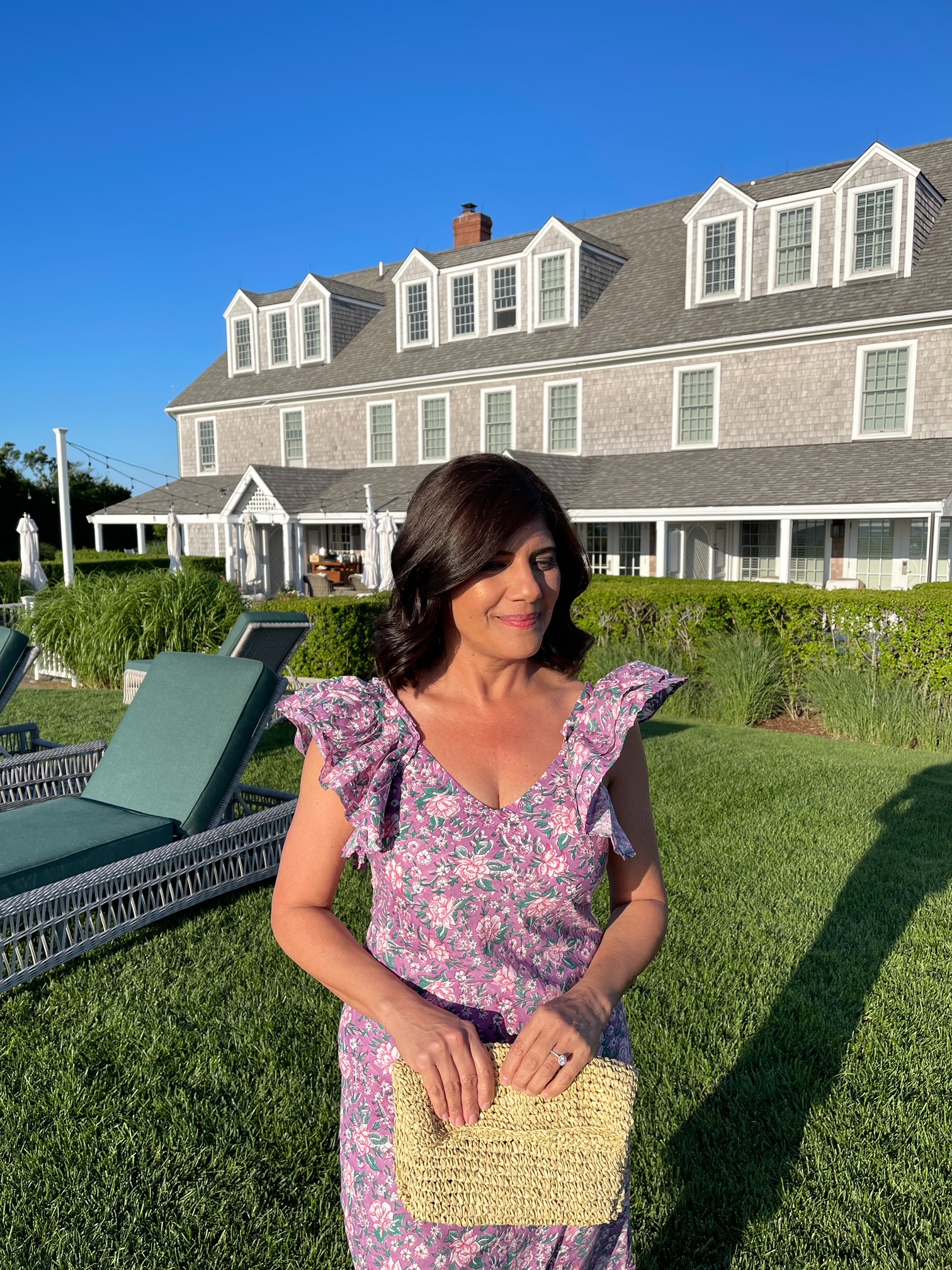 Desiree Leone of Beautifully Seaside wearing block print summer dresses in Nantucket