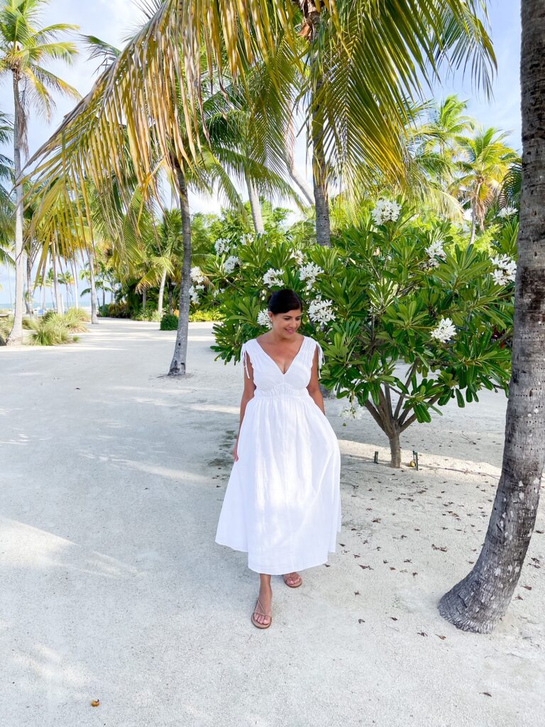 Desiree Leone of Beautifully Seaside features late summer styles and a beautiful white midi dress for summer vacation. Shop it on sale!