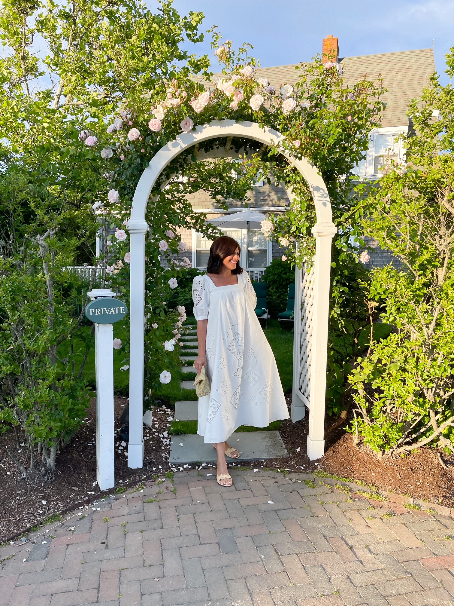 Desiree Leone of Beautifully Seaside wearing a white Hunter Bell NYC Waverly Dress in Nantucket