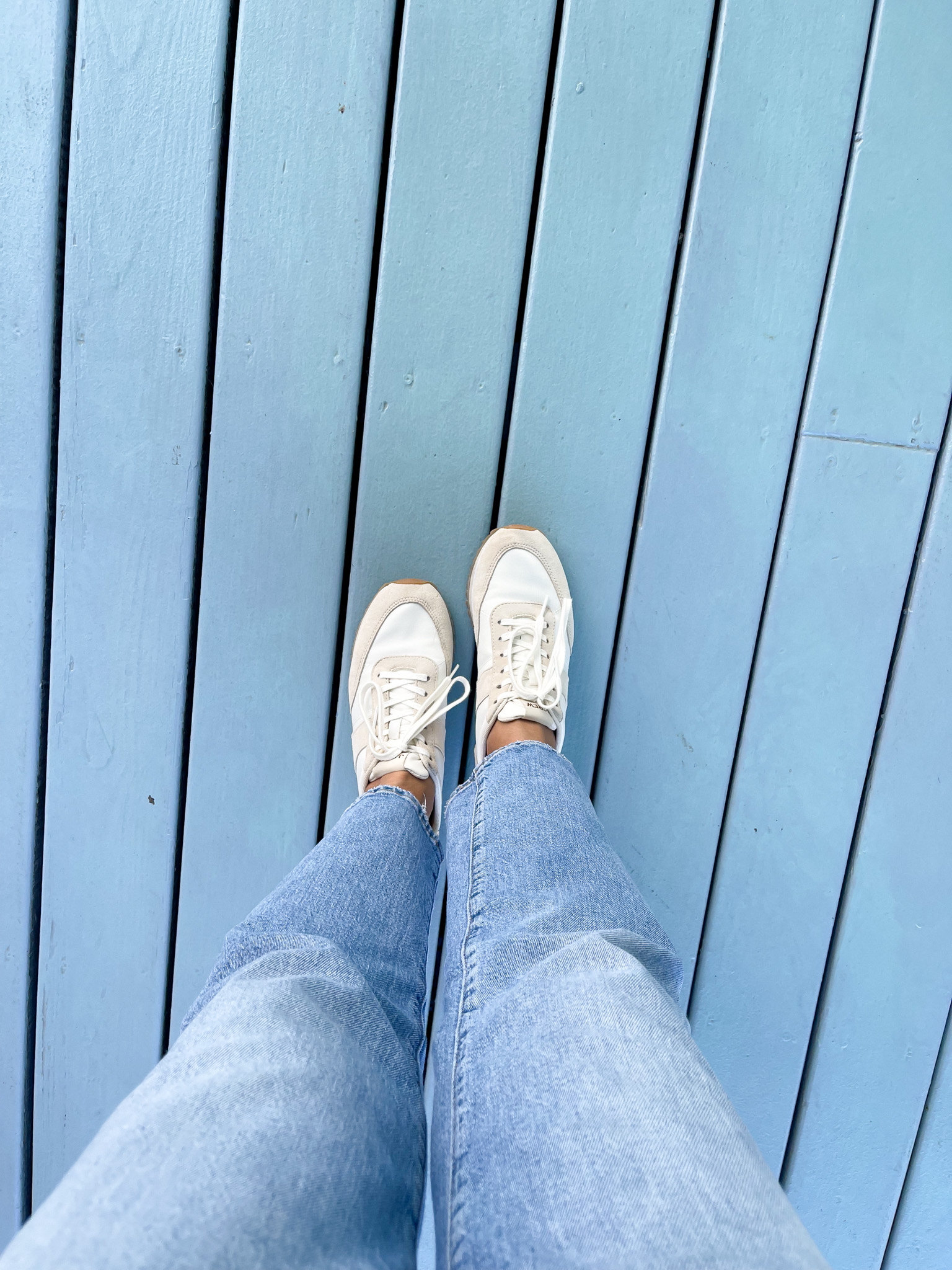 Desiree Leone of Beautifully Seaside shares the cutest sale finds to wear now, like these J.Crew trainers.