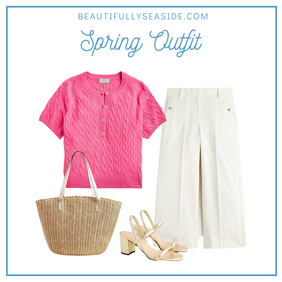 A J.Crew spring outfit featuring a cashmere cable-knit short sleeve sweater, white wide leg trousers, straw woven bag, and gold heeled sandals.