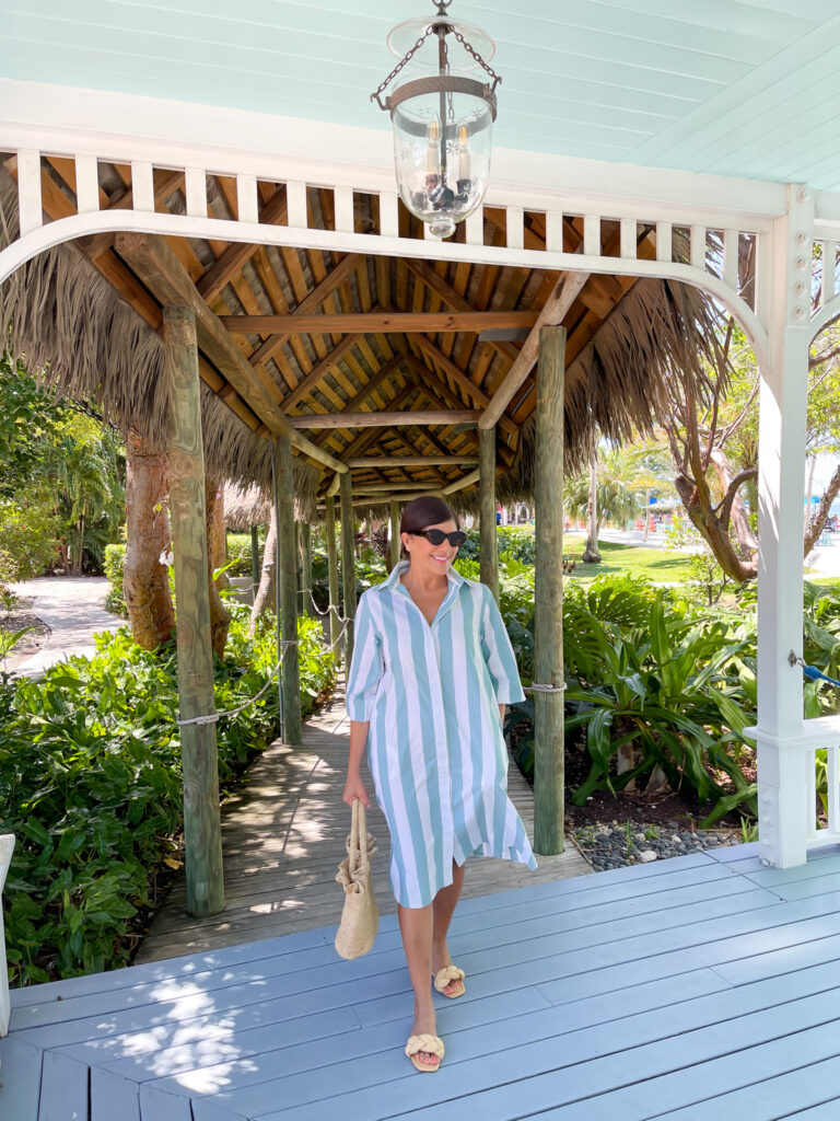 Desiree Leone of Beautifully Seaside wearing a LAKE caftan in bold stripes for spring