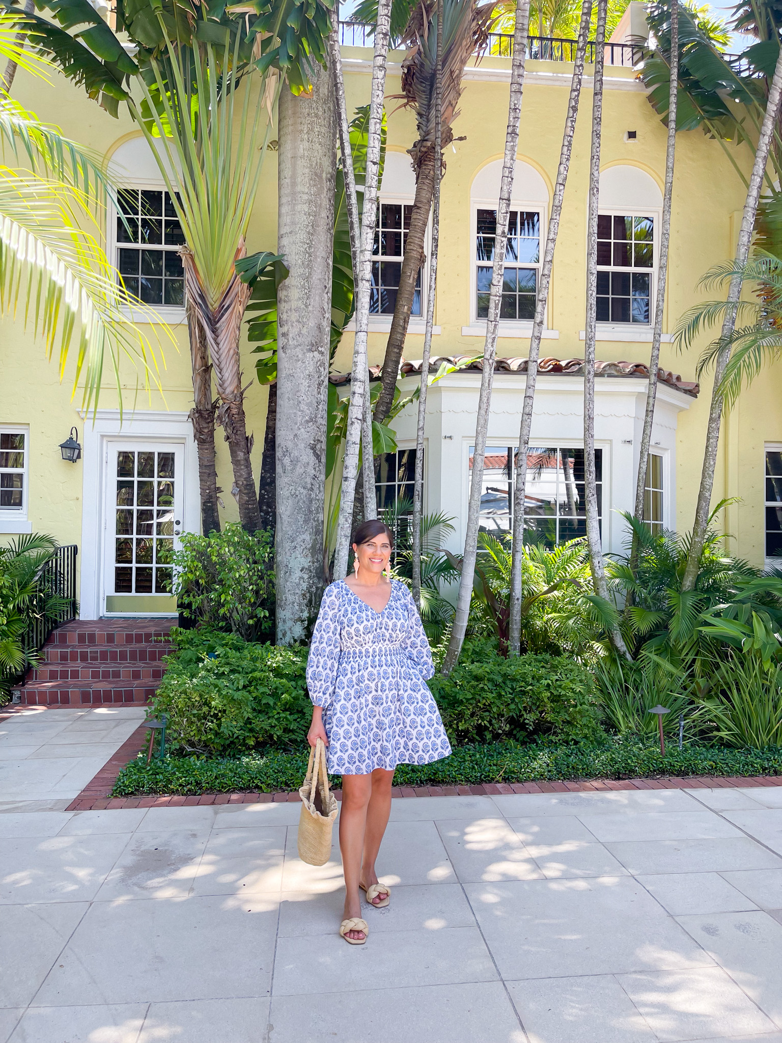 Desiree Leone of Beautifully Seaside wearing a J.Crew block print dress for summer.