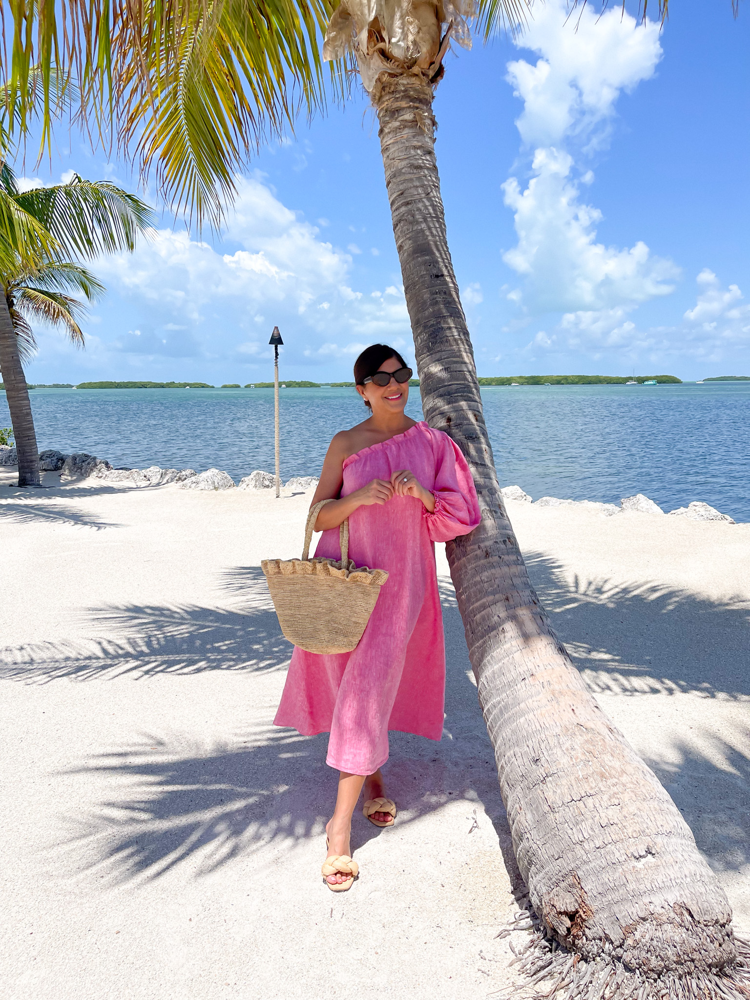 Desiree Leone of Beautifully Seaside blog features the prettiest summer ready pajamas and dresses at LAKE, including this one shoulder linen dress.