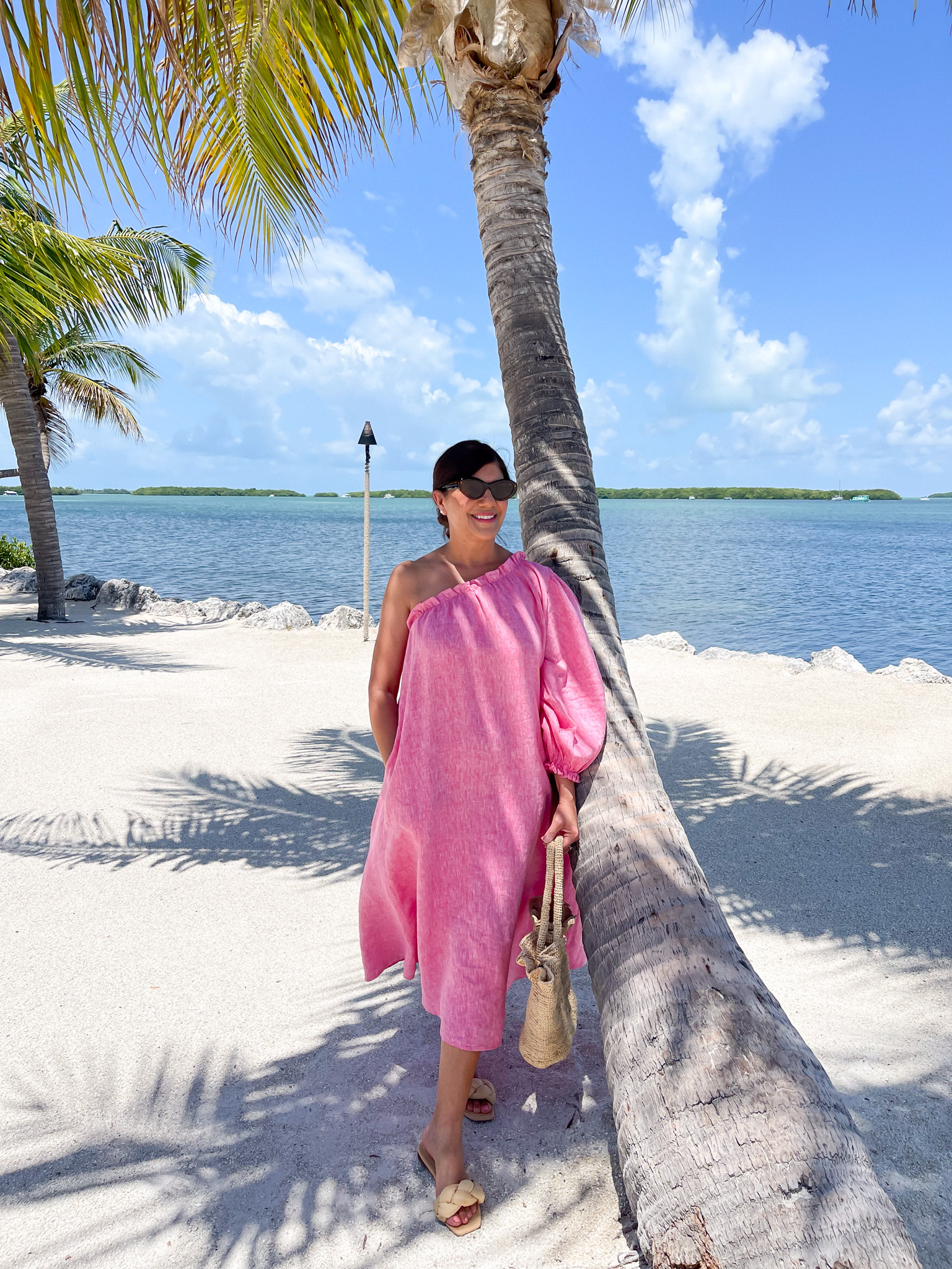 Desiree Leone of Beautifully Seaside wearing a summer dresses by LAKE.