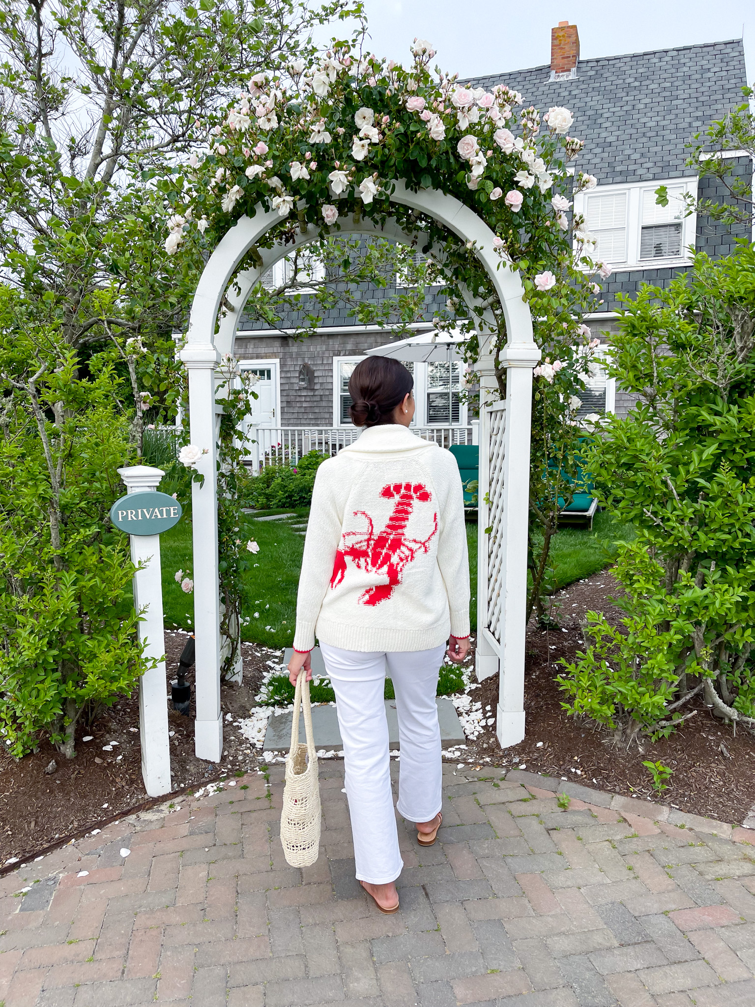 Desiree Leone of Beautifully Seaside features the lobster cardigan sweater she wore while in Nantucket this summer.