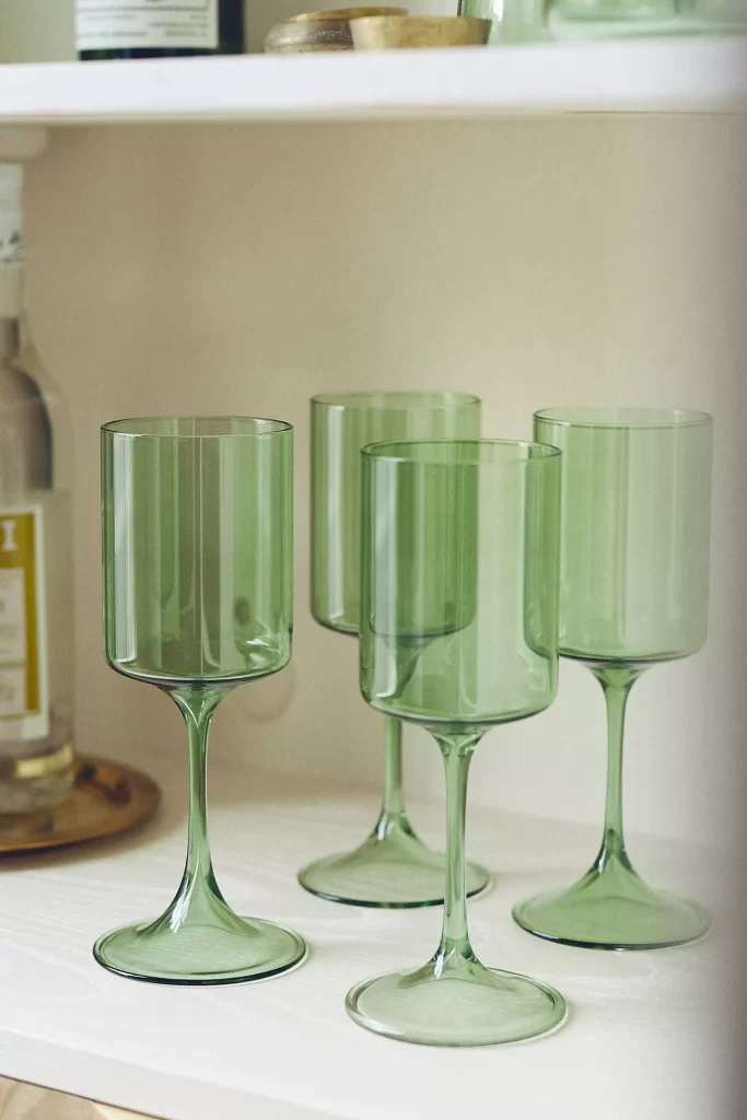 Desiree Leone of Beautifully Seaside is sharing everything that's in my cart from Anthropologie's new fall collection, like these green wine glasses.