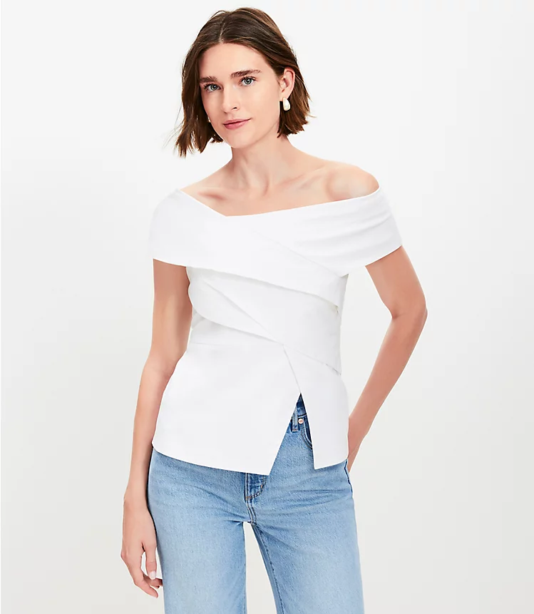 Desiree Leone of Beautifully Seaside shares 15 beautiful tops to wear with denim jeans for the easiest outfit ever, including this white asymmetrical top.