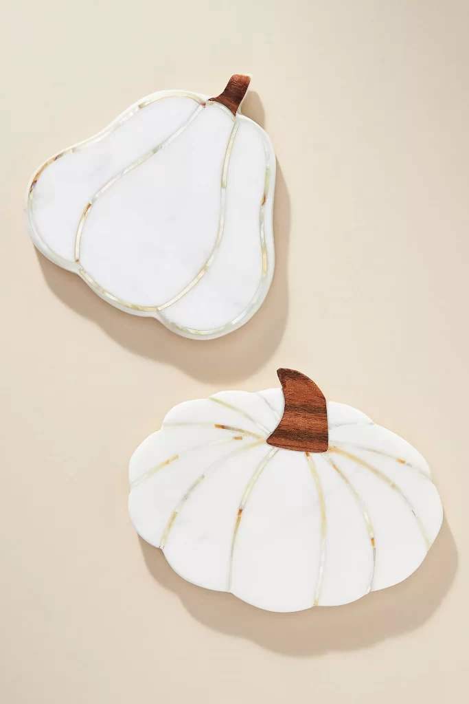 Desiree Leone of Beautifully Seaside is sharing everything that's in my cart from Anthropologie's new fall collection, like these marble pumpkin coasters.