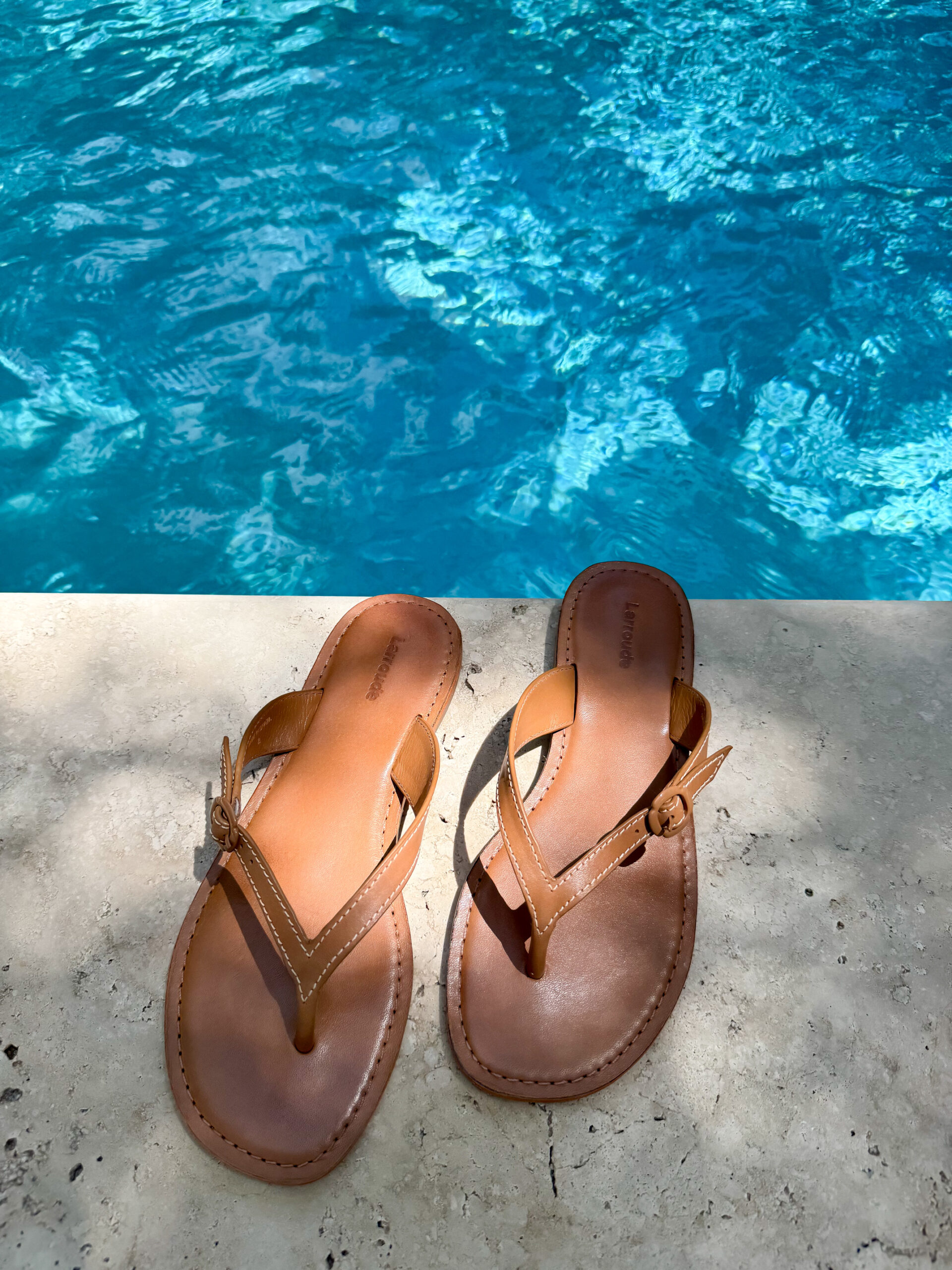 Flip-Flops Are Back (And They’ve Never Looked This Good)—these elevated leather styles are perfect for coastal days and summer nights.