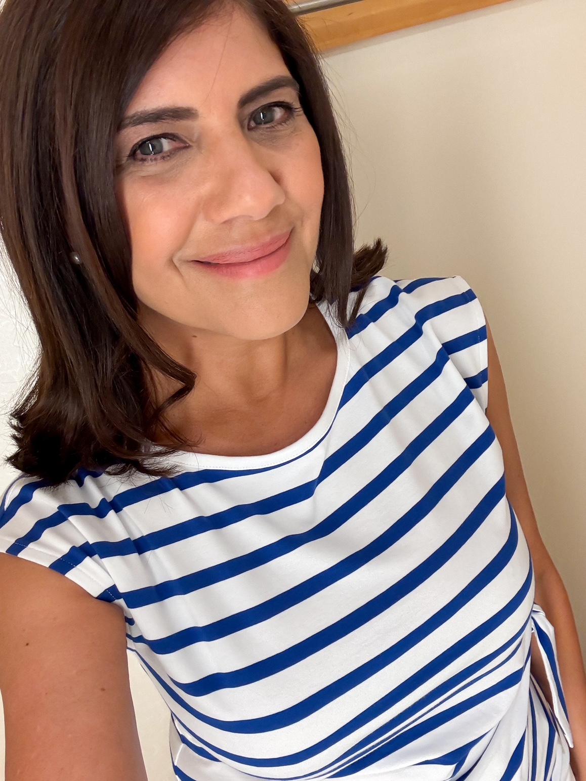 Your new favorite work tops—with that coastal weekend feel, featuring lots of stripes and shades of blue.